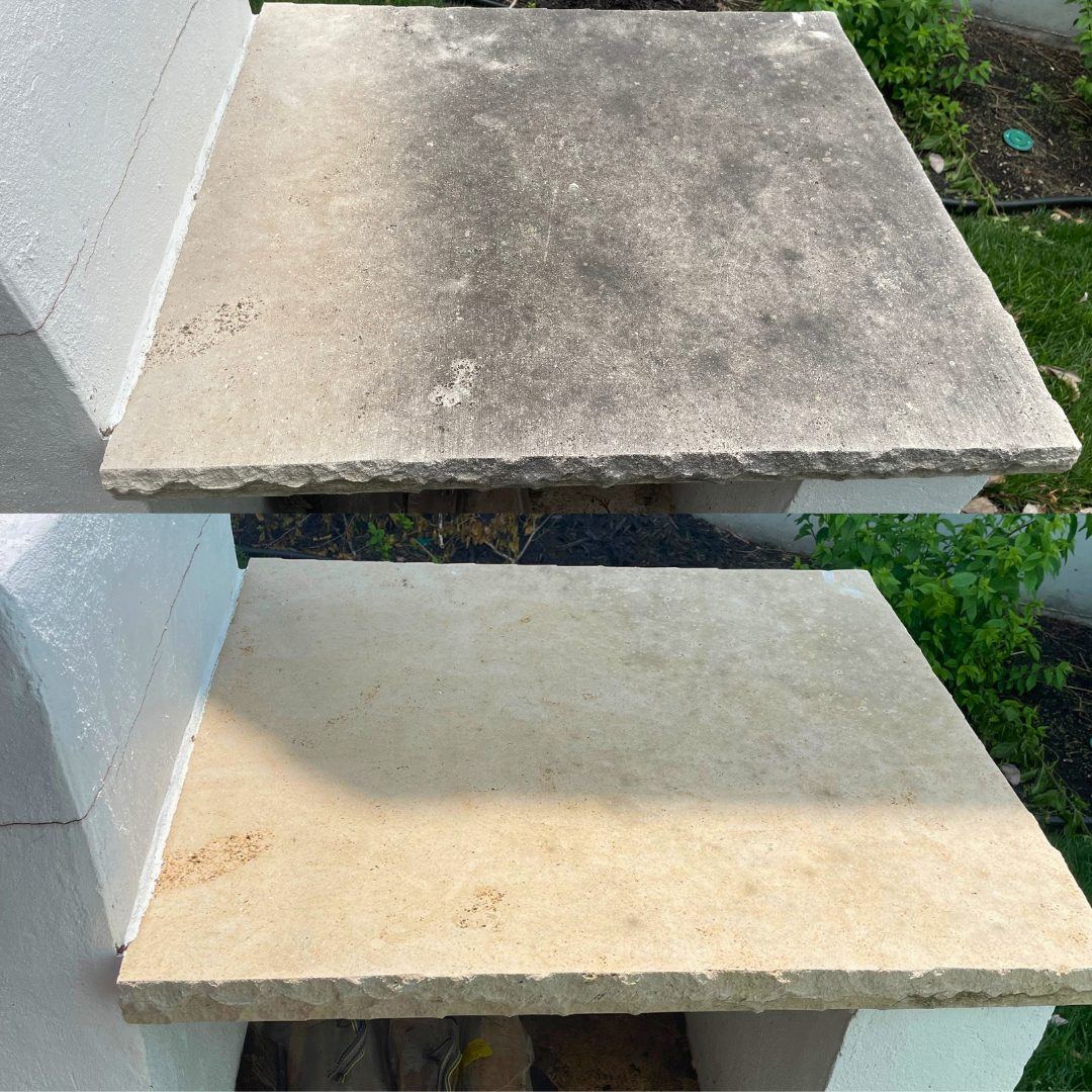 Close-up before and after pressure washing of a stone cap in Lees Summit, MO, moss and dirt removed to reveal clean natural stone