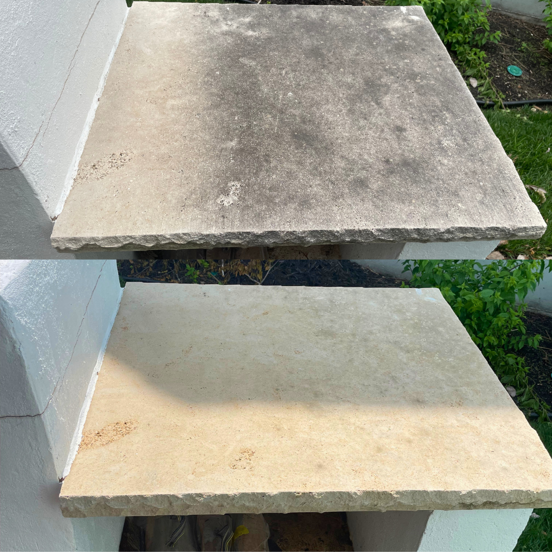 Close-up before and after pressure washing of a stone cap in Lees Summit, MO — moss and dirt removed to reveal clean natural stone