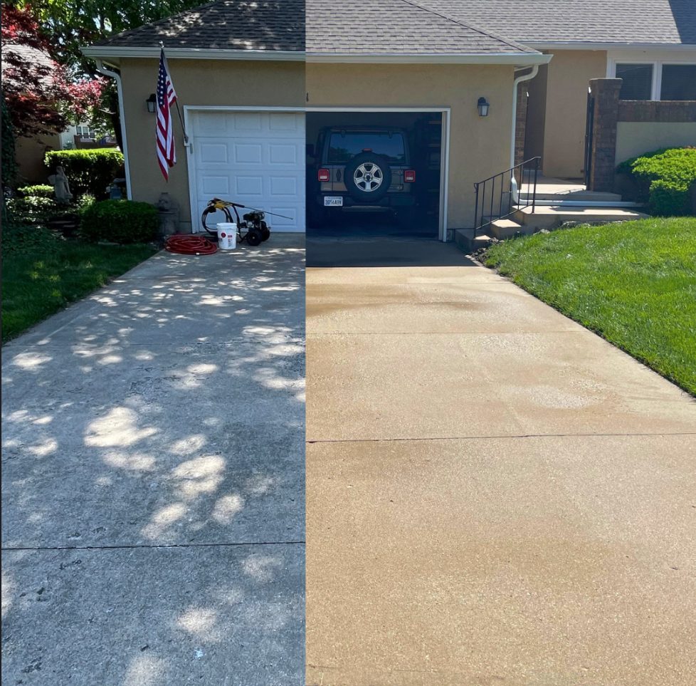 Before and after pressure washing of a concrete driveway in Olathe, KS, split-screen with the dirty, shaded left side and the clean right side