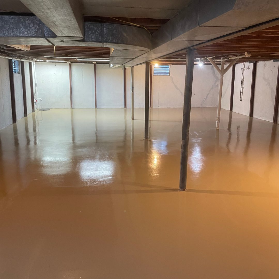 Close-up of the flake and clear topcoat on a finished basement floor coating
