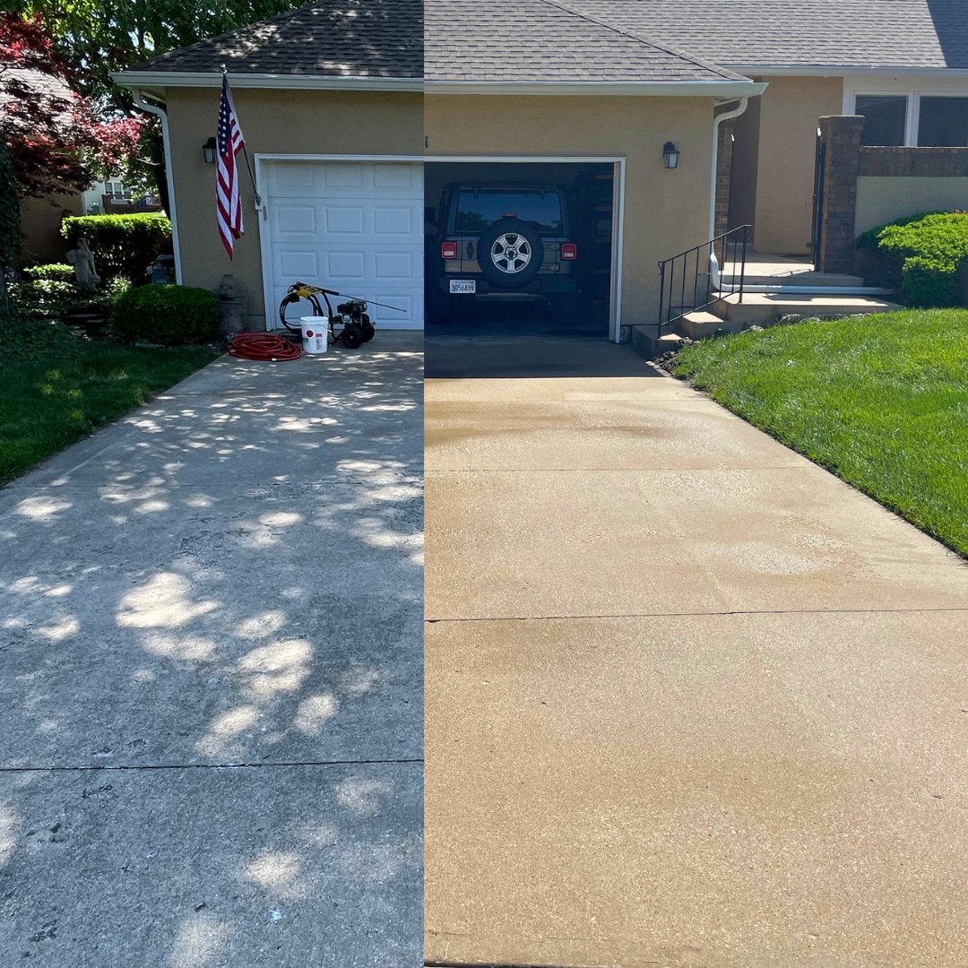 Before and after pressure washing of a concrete driveway in Overland Park, KS — split-screen showing dirty left side and clean right side