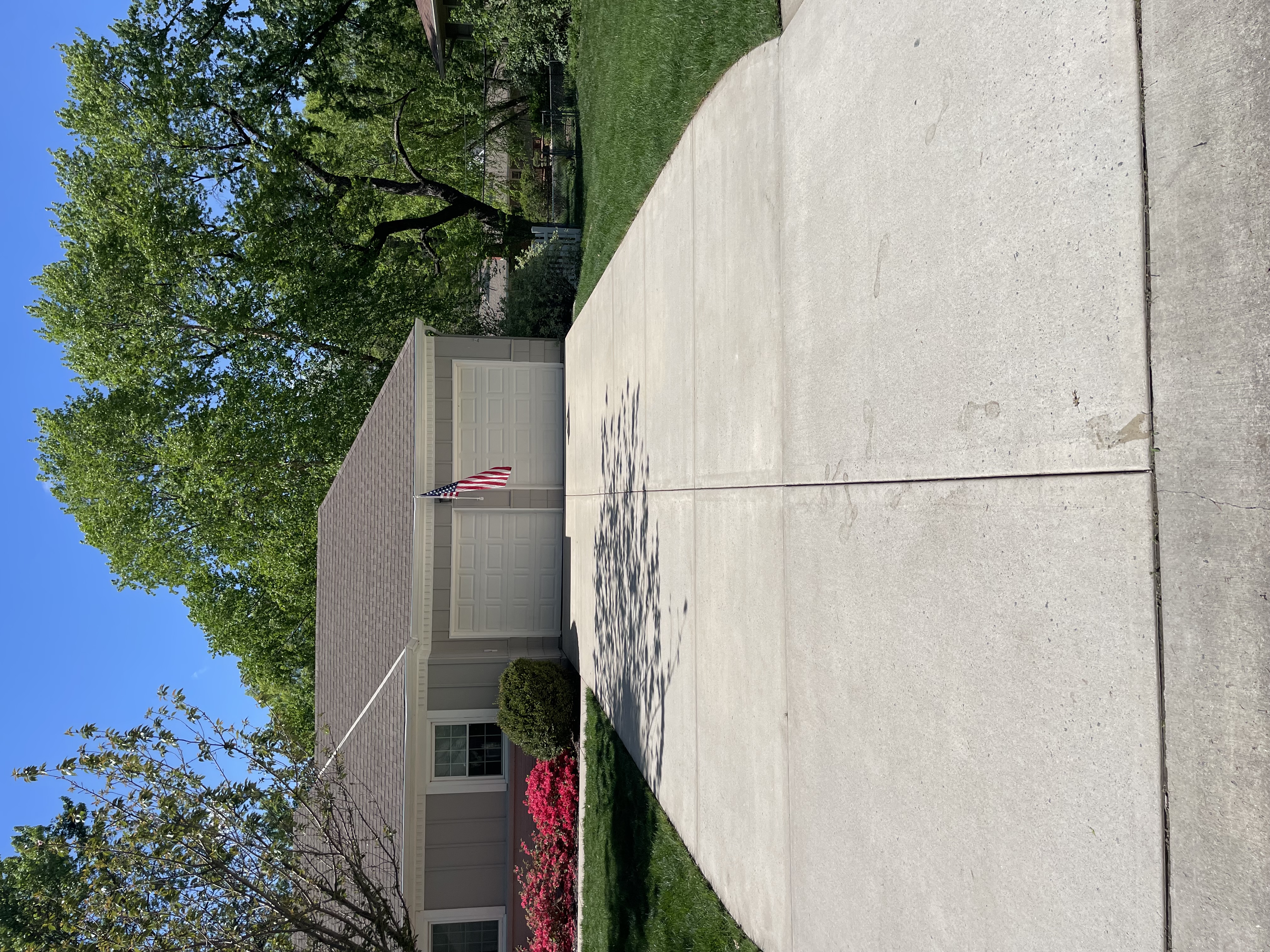 Freshly sealed concrete driveway in Kansas City